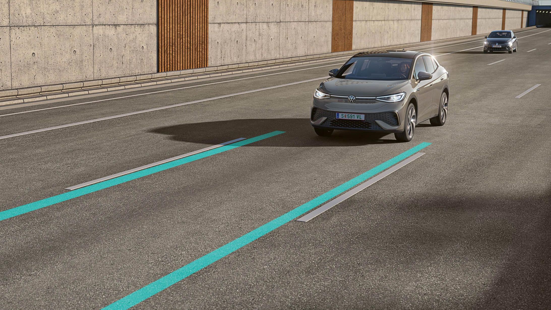 Illustration zeigt schematisch anhand eines VW ID.5 die Funktionsweise des Lane Assist.